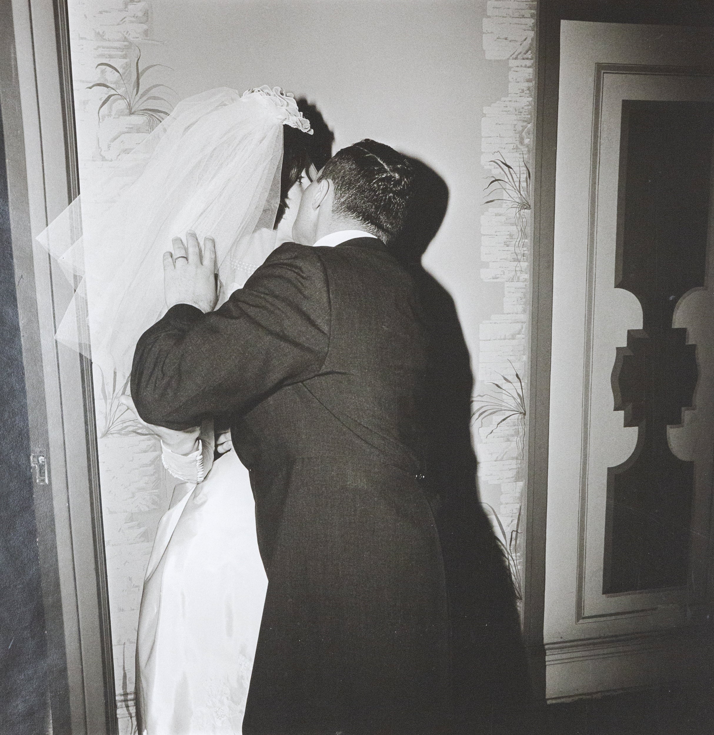 DIANE ARBUS "GROOM KISSING HIS BRIDE", 1966 - Image 12